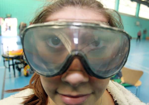 Tresham student Georgia Lack wearing goggles which give the effect of being over the drink-drive limit
