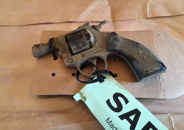 A hand gun has been found in woodland near Warkton