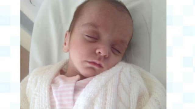 The mother of a baby found in a box in Corby has still not been found