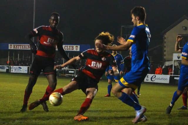 Liam Canavan fires home Kettering Town's opening goal against Paulton Rovers