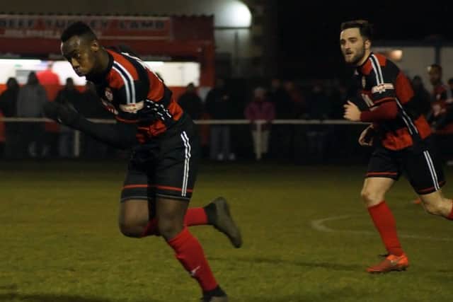 Silvano Obeng celebrates after he completed the Poppies' 2-0 win over Paulton Rovers at Latimer Park