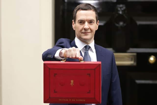 The Chancellor of the Exchequer George Osborne outside No 11 Downing Street, London, before delivering the Budget Statement in the House of Commons. PRESS ASSOCIATION Photo. Picture date: Wednesday July 8, 2015. Photo credit should read: Yui Mok/PA Wire