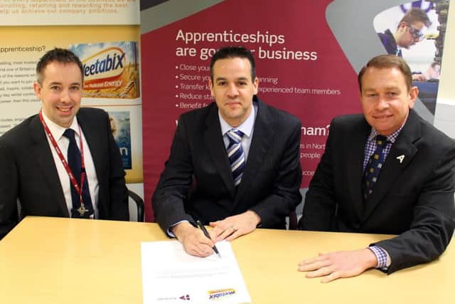 David Higham, vice-principal at Tresham, Neil Clarke, business unit operations manager, and Kettering MP Philip Hollobone
