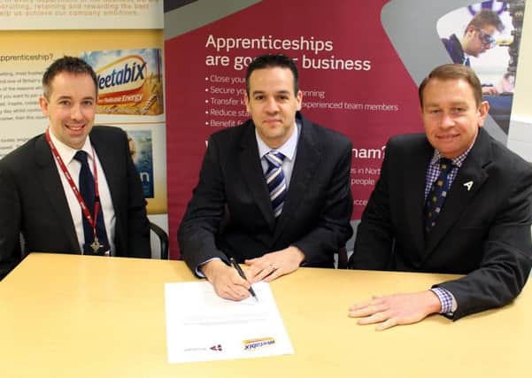 David Higham, vice-principal at Tresham, Neil Clarke, business unit operations manager, and Kettering MP Philip Hollobone