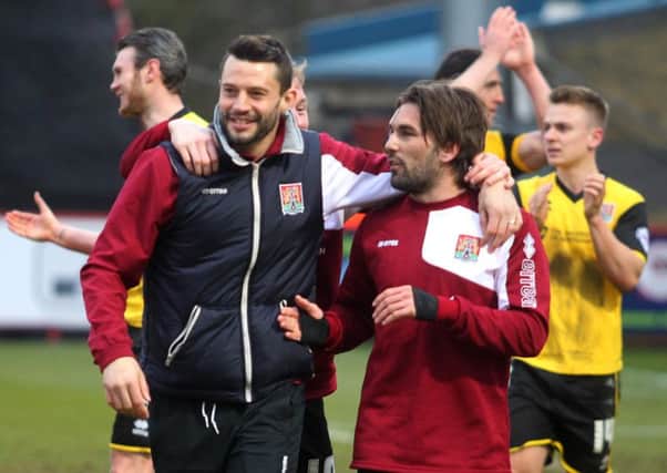 WELL DONE, MATE - Ricky Holmes is congratulated on his stunning winner by Marc Richards (Pictures: Sharon Lucey)