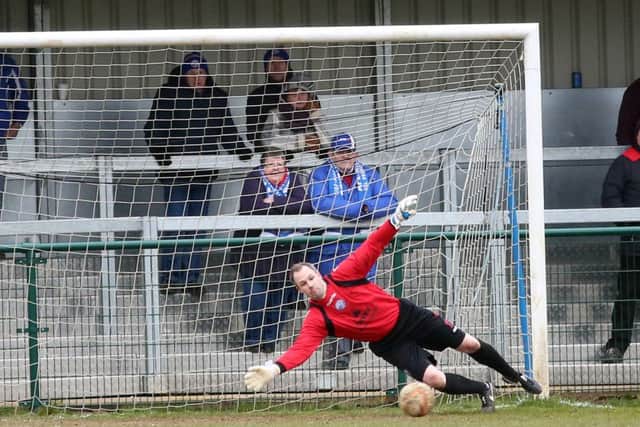 Diamonds goalkeeper Matt Finlay is beaten by Ben Peden's shot, which gave Uxbridge the lead