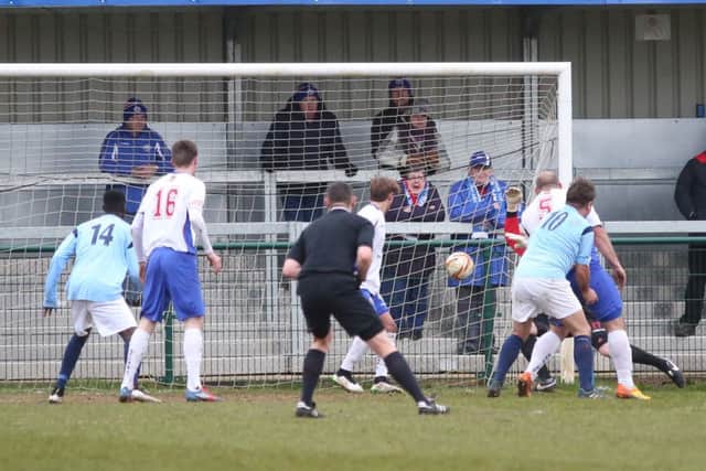 Wayne Carter heads home Uxbridge's winner during the 2-1 success over AFC Rushden & Diamonds