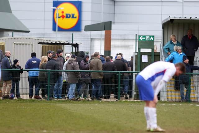 AFC Rushden & Diamonds' fans head for the exit after a late goal sent their team to a 2-1 home defeat to Uxbridge - their fourth loss in a row. Picture by Alison Bagley