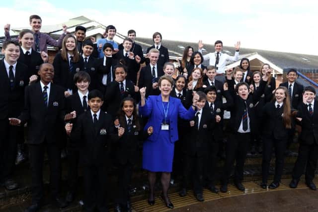 Victoria Bishop and some of the pupils celebrating the school's outstanding Ofsted inspection in January 2015
