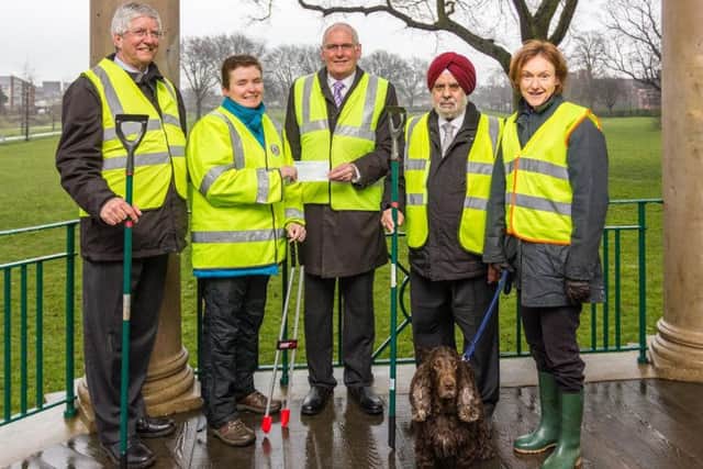 Bovis Homes presenting the cheque to the Castle Fields Community Group in Wellingborough