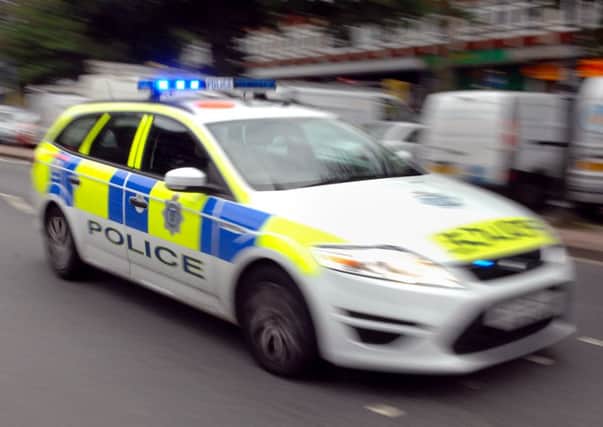 Three men have been arrested and charged after a burglary incident at a Wellingborough shop.