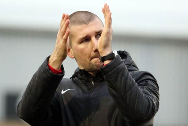 Tommy Wright is staying at Corby Town after he considered his position following the 3-0 defeat at AFC Telford United