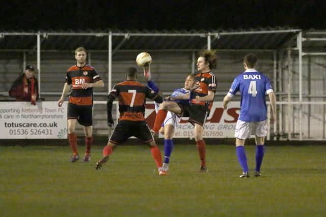 Action from Kettering Town's 3-1 success over Stratford Town at Latimer Park