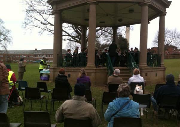 Wellingborough School's Brass Band playing at the Castle Fields bandstand in Wellingborough