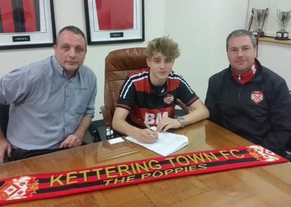 Seventeen-year-old Ben Bradshaw signed a contract with Kettering Town earlier this year, watched by his dad Nick and Poppies chairman Ritchie Jeune