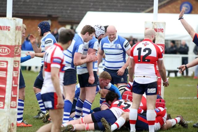 Action from Wellingborough's Midlands One East derby win over Kettering