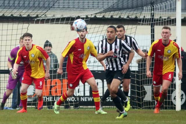 Action from Corby Town's 0-0 draw with Hednesford Town. The Steelmen head to leaders Solihull Moors this afternoon. Picture by Alison Bagley