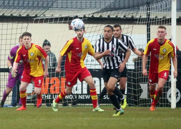 Action from Corby Town's 0-0 draw with Hednesford Town. The Steelmen head to leaders Solihull Moors this afternoon. Picture by Alison Bagley