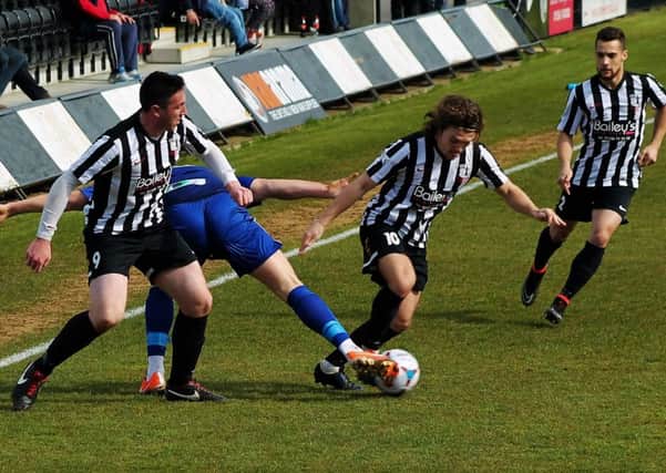Ben Milnes gets on the ball during Corby Town's 3-2 home defeat to Alfreton Town last weekend. Picture by David Tilley