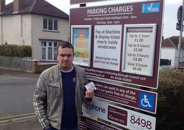 Cllr Clark Mitchell is proposing councillors rights to free parking are scrapped