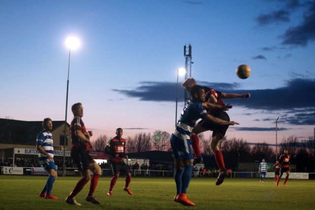 Action from Kettering Town's victory over Dunstable Town, which enhanced their chances of reaching the play-offs