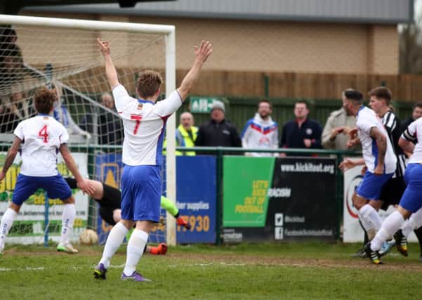 Liam Dolman scores the only goal as AFC Rushden & Diamonds beat Hanwell Town at the Dog & Duck. Pictures by Alison Bagley