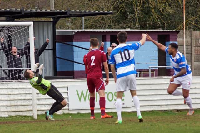 Rene Howe scores Kettering Town's first goal during the 3-0 success at Chesham United. Pictures by Peter Short