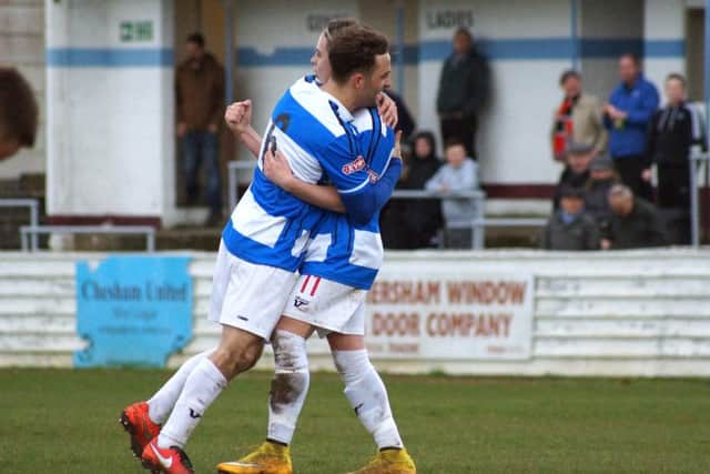 Will Grocott congratulates Ben Stephens after the latter scored Kettering Town's third goal in the 3-0 success at Chesham United on Saturday. Picture by Peter Short