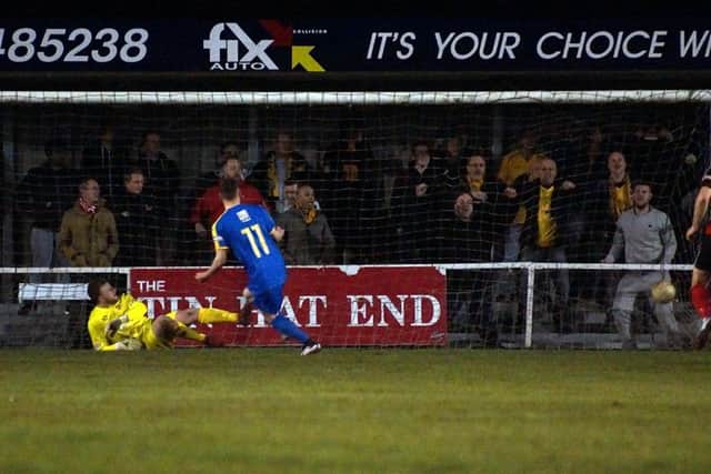 Sam Austin beats Craig Hill from the penalty spot to score Leamington's equaliser