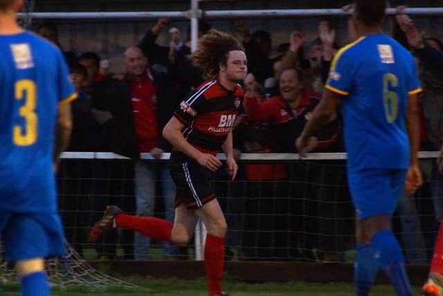 Liam Canavan heads off to celebrate after breaking the deadlock against Leamington