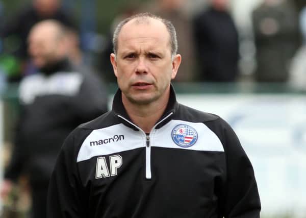 Andy Peaks insists AFC Rushden & Diamonds' main priority is to seal a play-off place as they go to leaders Egham Town this weekend