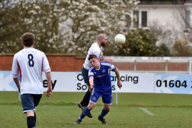 Action from Thrapston Town's 3-0 defeat at ON Chenecks last weekend