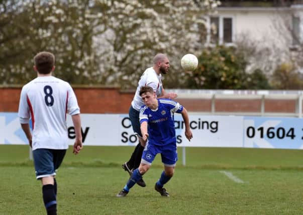 Action from Thrapston Town's 3-0 defeat at ON Chenecks last weekend