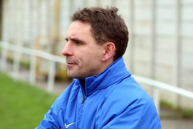 Wellingborough Town boss Jon Mitchell is remaining confident about his team's chances of avoiding the drop