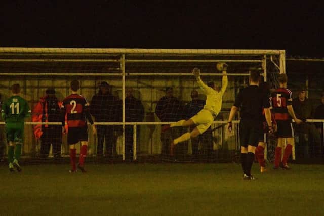 Luke Rowe's free-kick beats Kettering Town goalkeeper Craig Hill for the only goal at Latimer Park as Bedworth United claimed a shock 1-0 success. Picture by Jim McAlwane UFXhxTg23L7aYDARTIxJ