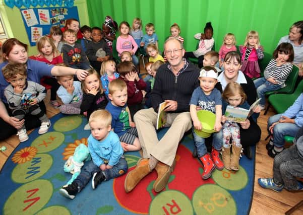 Author Ian Whybrow with children at Busy Bees nursery in Kettering