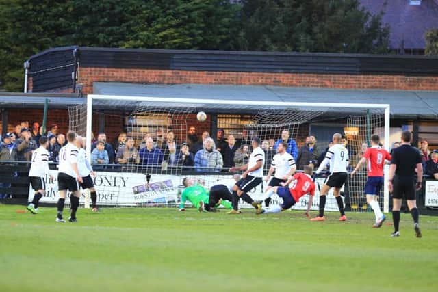 Jack Bowen scores AFC Rushden & Diamonds' opening goal in the 2-1 play-off success at Royston Town. Picture by Kevin Richards