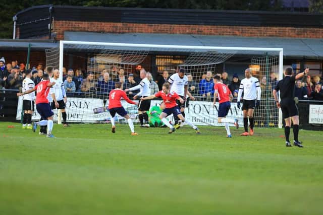 Jack Bowen celebrates after giving AFC Rushden & Diamonds the lead in their play-off semi-final success at Royston Town. Picture by Kevin Richards