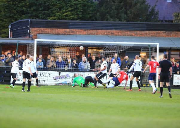 Jack Bowen opened the scoring for AFC Rushden & Diamonds in their win at Royston Town with this effort before Liam Dolman added the second from the penalty spot. Picture by Kevin Richards