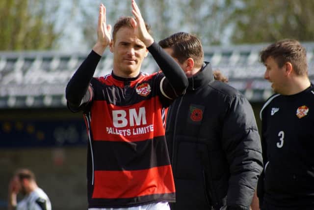 Kettering Town legend Brett Solkhon says he would stay at the club 'for life' as long as they want him
