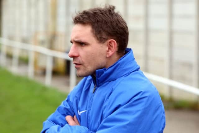 Jon Mitchell's Wellingborough Town need just one more point to confirm their UCL Premier Division status