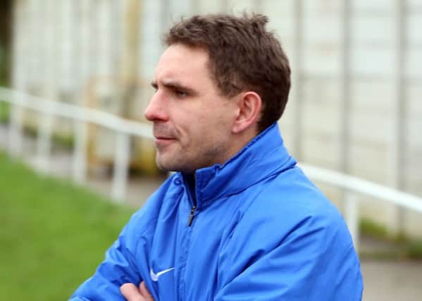 Jon Mitchell's Wellingborough Town side secured their UCL Premier Division status with a 3-2 victory over Harrowby United in their last game of the season