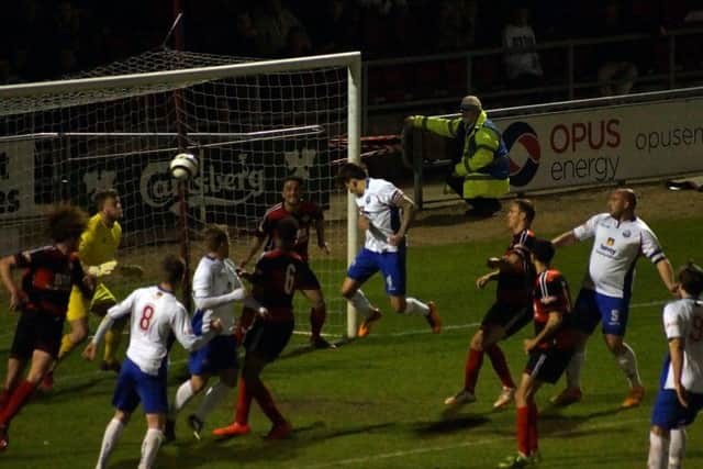 Jack Ashton powers home the stoppage-time head that won the NFA Hillier Senior Cup for AFC Rushden & Diamonds. Pictures by Peter Short