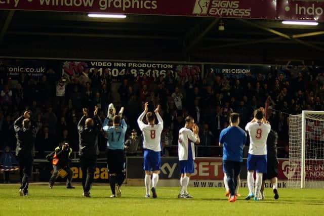 The AFC Rushden & Diamonds players applaud their fans following their NFA Hillier Senior Cup success over Kettering Town at Sixfields