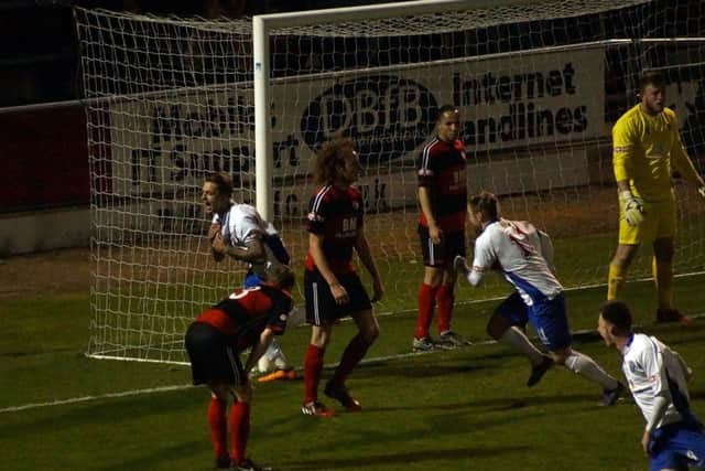 Jack Ashton celebrates after he scored AFC Rushden & Diamonds' dramatic late winner against Kettering Town in the NFA Hillier Senior Cup final. Picture by Peter Short