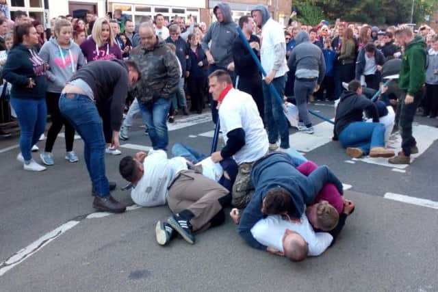 Rothwell townsfolk attempt to disarm the bailiff's guards.