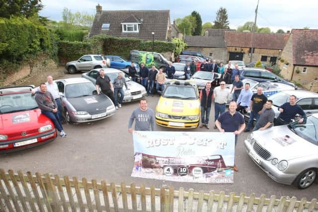 Rust Buckets: Cranford: Pre-meet of the Rust Bucket Rally, people driving 2,500 miles across Europe in old banger cars to raise money for Down's Syndrome charity  - Ups and DownsTuesday May 17 2016 NNL-160517-201851009