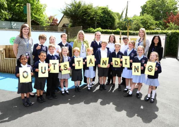 Outstanding Ofsted: Cranford: Cranford Cof E Primary School, Oustanding Ofsted report. 
Teaching staff l-r Kirsty Wright (YR teacher), Julie Grey (Head Teacher), Estelle Harding (Yr 1/2), Jessica D'Arienzo (TA) celebrate with pupils 
Tuesday May 24 2016 NNL-160524-181346009
