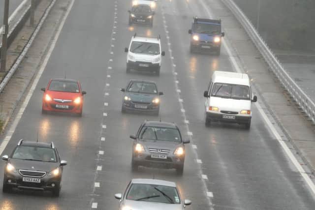 25/08/14 CS
Traffic caught up in the wet bank holiday weather on the M27 at Hilsea.
Picture: Ian Hargreaves (142524-1) PPP-140825-164646003