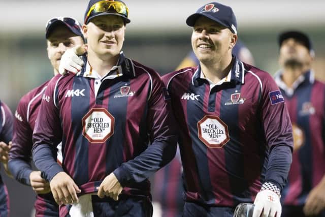 Josh Cobb (left) walks off the field after helping the Steelbacks to the win obver Durham last week